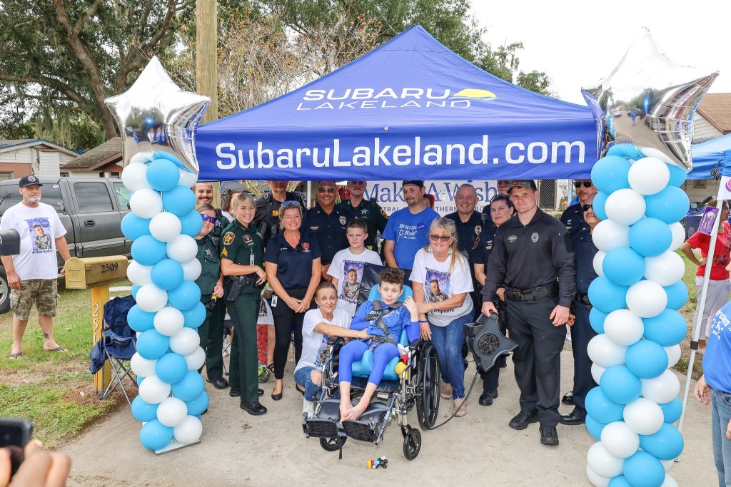 Wish kid Braxton attending his wish parade