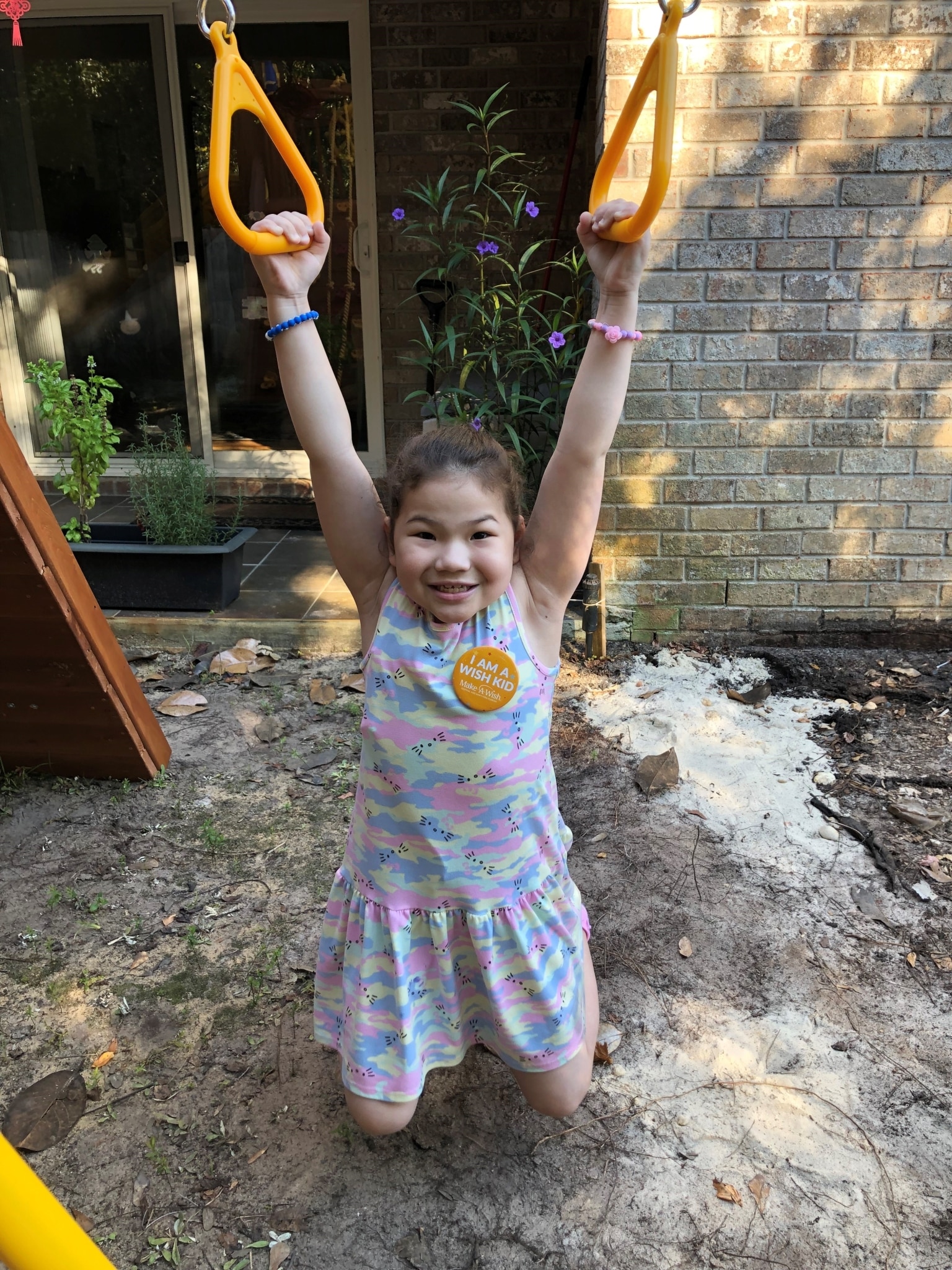 Wish kid Evelyn on her playset