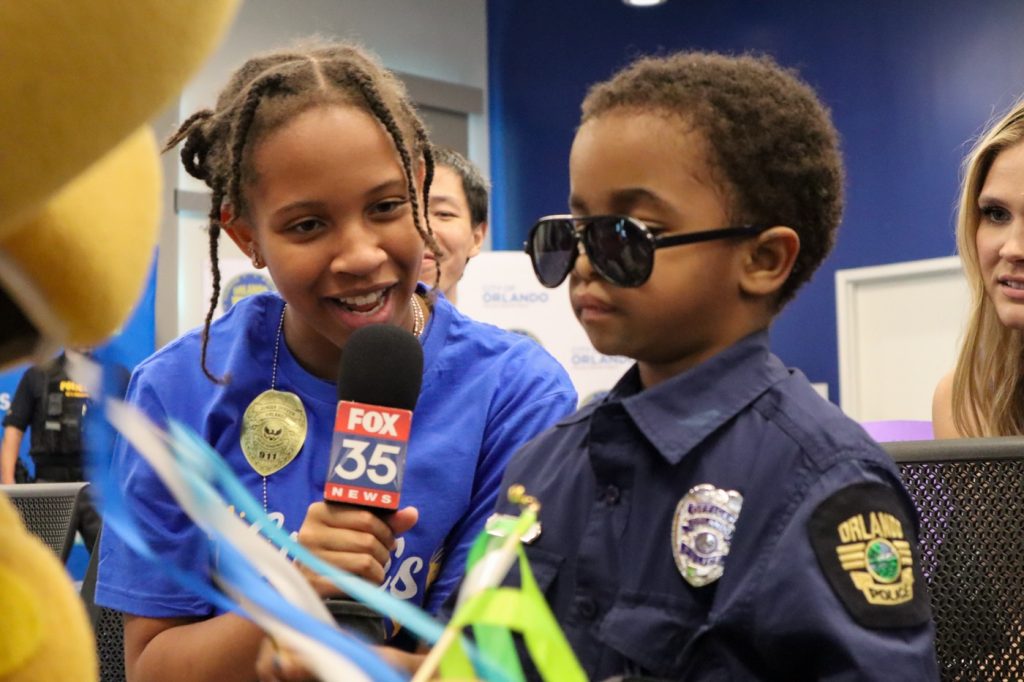 Wish Kid Officer Stone interviewed by local reporter
